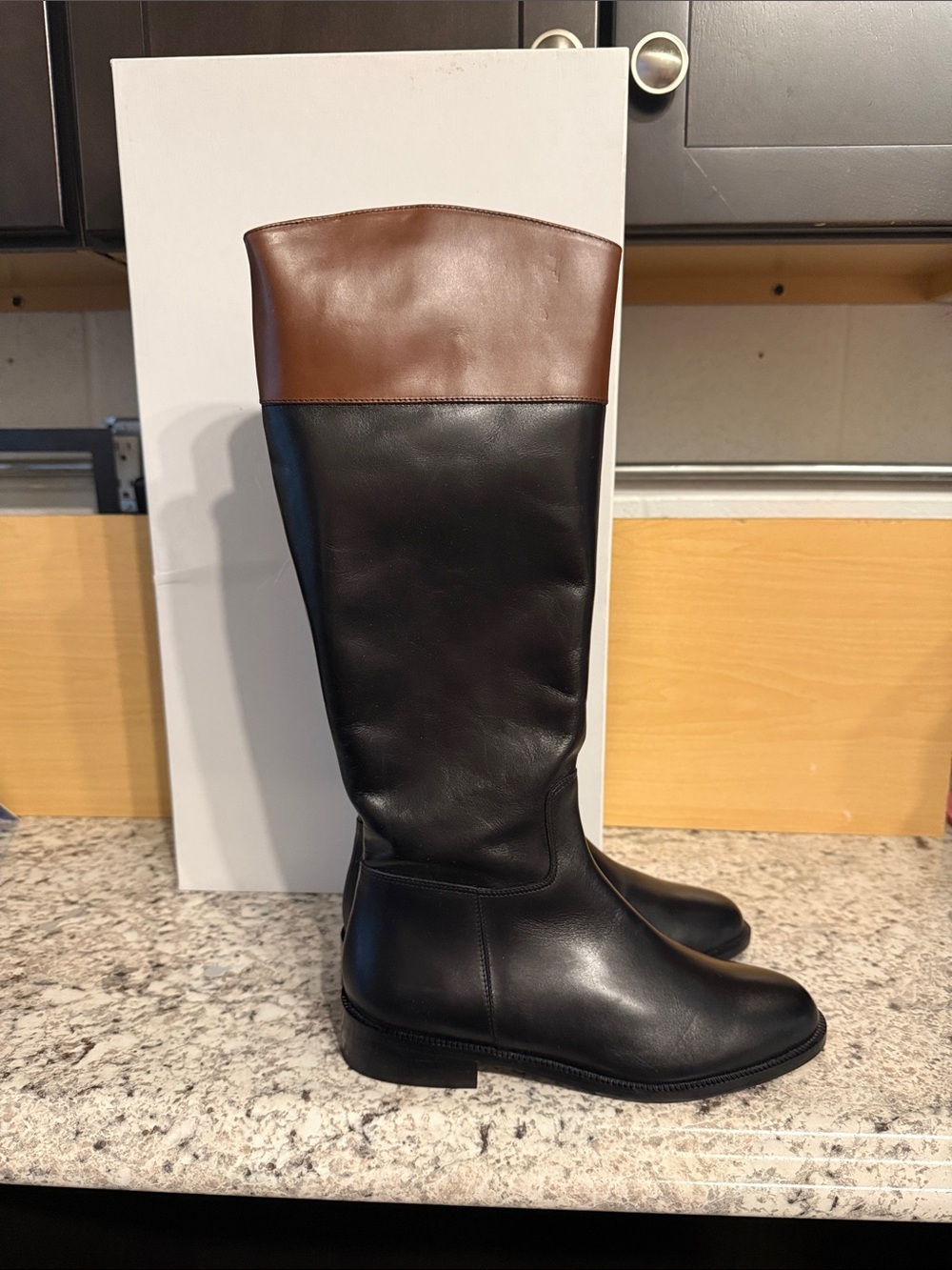 New in box. Saks fifth Avenue Kensington riding boot in black with brown trim